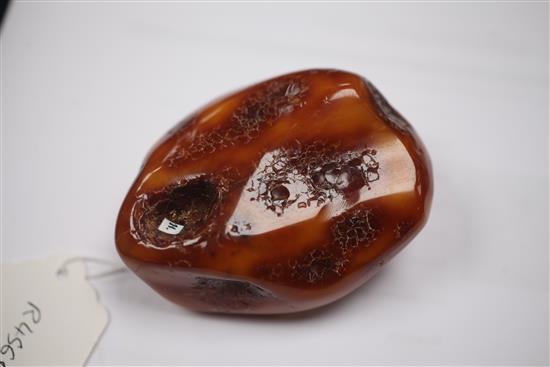 A free form piece of raw amber, gross weight 112 grams, 82mm.